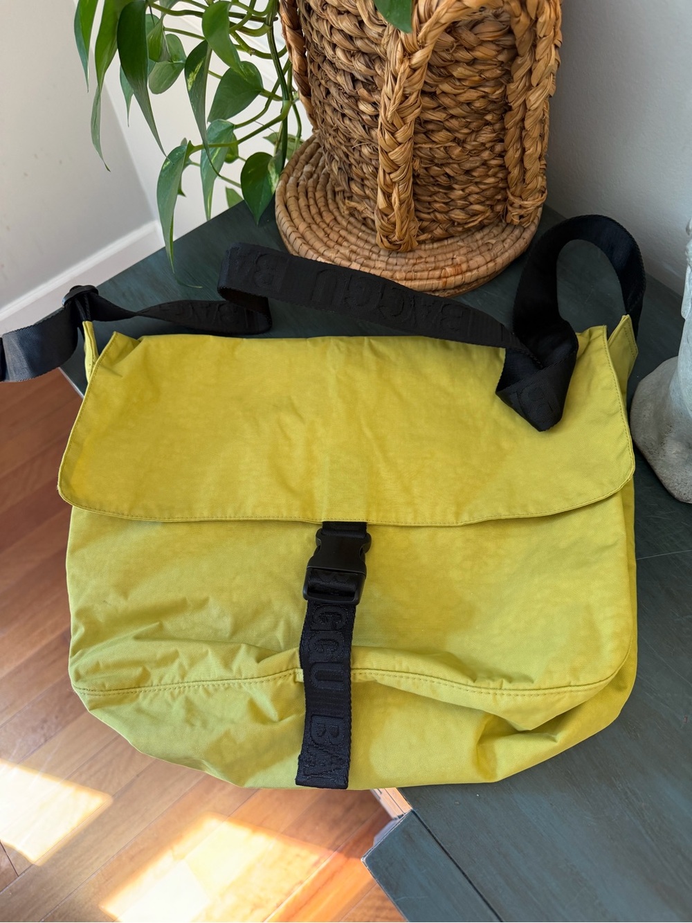 BAGGU nylon Messenger bag in bright chartreuse/yellow-green color known as Lemon